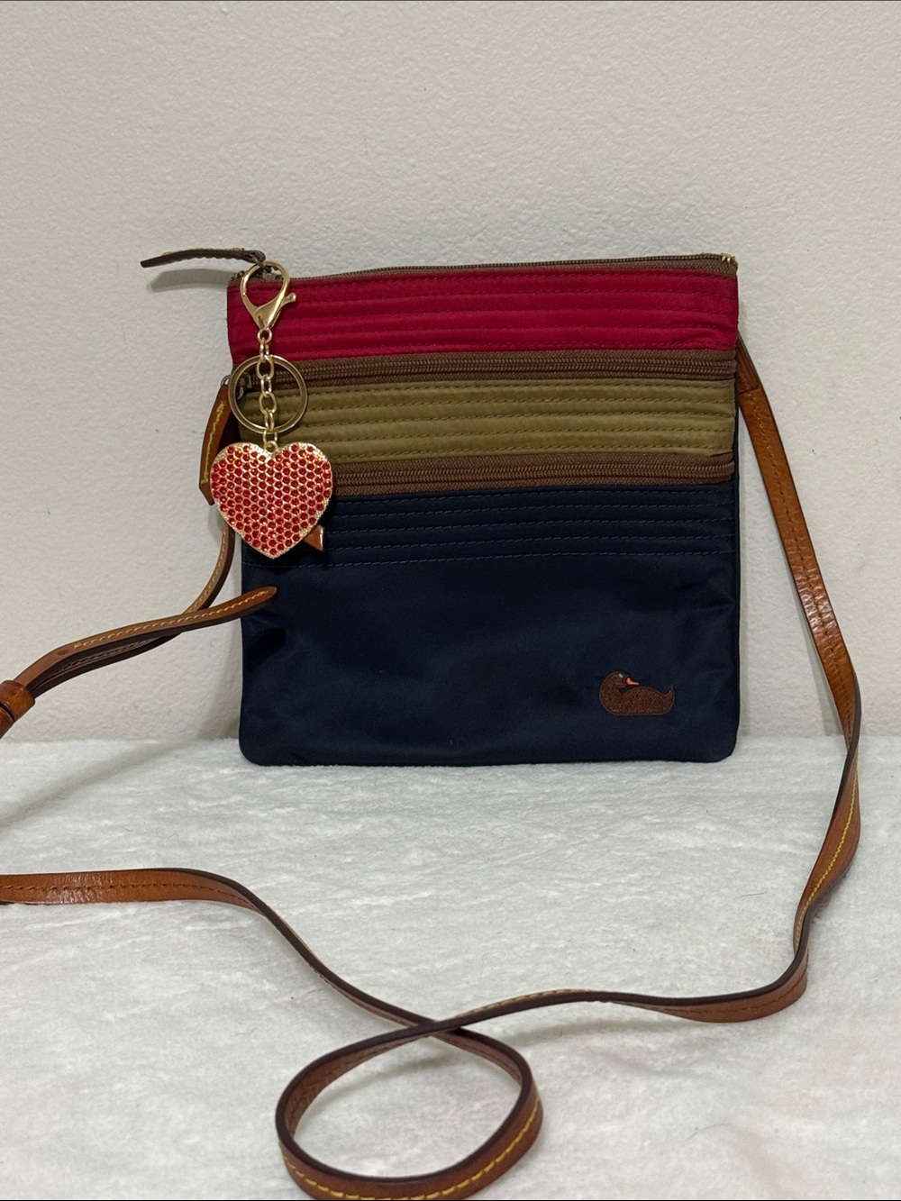 Dooney & Bourke Nylon Colorblock Crossbody in Navy, Red, Olive with 3 zip pocket